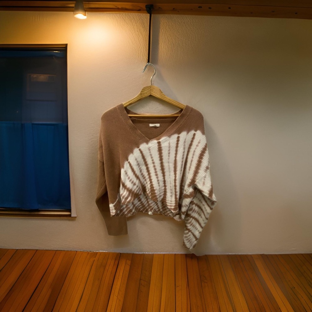 Brown and White V-Neck Sweater with Unique Sunburst Design